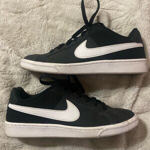 Black Nikes, size 7.5